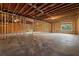 Spacious unfinished basement with exposed ceiling and framework, ready to be transformed into living space at 3267 Sewell Mill Rd, Marietta, GA 30062