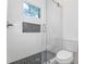 Modern bathroom featuring a tiled shower with glass door, and a tiled niche at 3267 Sewell Mill Rd, Marietta, GA 30062