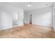 Spacious bedroom featuring hardwood floors, ceiling fan, and neutral paint palette at 3267 Sewell Mill Rd, Marietta, GA 30062