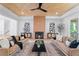 Cozy living room with a wood-paneled ceiling, fireplace, and stylish decor at 3267 Sewell Mill Rd, Marietta, GA 30062