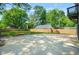 Large backyard featuring a new fence and ample space for outdoor activities and relaxation at 34 Candler Ne Rd, Atlanta, GA 30317