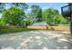 Large backyard featuring a new fence and ample space for outdoor activities and relaxation at 34 Candler Ne Rd, Atlanta, GA 30317