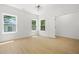 Bright and spacious bedroom with natural light, wood floors, and clean, modern design at 34 Candler Ne Rd, Atlanta, GA 30317
