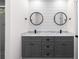 Contemporary bathroom with double vanity, modern fixtures, and shiplap accent wall, offering a stylish and functional space at 1334 Milton Se Pl, Atlanta, GA 30316