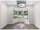 Bright dining area with a bay window providing natural light and views, creating an inviting space for meals at 1334 Milton Se Pl, Atlanta, GA 30316