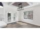 Cozy dining area featuring a modern light fixture, gray washed ceiling, and natural light at 1334 Milton Se Pl, Atlanta, GA 30316