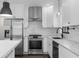 Well-appointed kitchen with stainless steel appliances and subway tile backsplash at 1334 Milton Se Pl, Atlanta, GA 30316