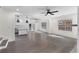 Open concept living space with hardwood floors and stainless steel kitchen appliances at 1334 Milton Se Pl, Atlanta, GA 30316