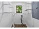 Functional pantry space with wire shelving, natural light, and painted white at 1334 Milton Se Pl, Atlanta, GA 30316