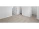 Bedroom with carpeted floors and view to ensuite bathroom at 3167 Moor View Rd # 35, Duluth, GA 30096