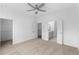 Spacious bedroom with carpeted floors and access to an ensuite bathroom and closet at 3167 Moor View Rd # 35, Duluth, GA 30096