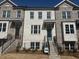 Charming brick townhome with well-manicured front yard and inviting entrance at 3167 Moor View Rd # 35, Duluth, GA 30096