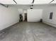 Spacious two-car garage with ample room for storage and parking at 3167 Moor View Rd # 35, Duluth, GA 30096