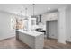 Open kitchen featuring modern appliances, a large island, and lots of natural light at 3167 Moor View Rd # 35, Duluth, GA 30096