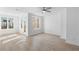 Bright living area features hardwood floors, white walls, and windows at 3167 Moor View Rd # 35, Duluth, GA 30096