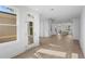 Bright, open-concept living space with hardwood floors and many windows at 3167 Moor View Rd # 35, Duluth, GA 30096