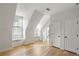 Bright bedroom with hardwood floors, window seats, and ample natural light at 5205 Riverview Nw Rd, Atlanta, GA 30327