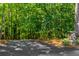 Stone monument marks the driveway entrance to the home at 5205 Riverview Nw Rd, Atlanta, GA 30327