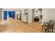 Inviting foyer featuring gleaming hardwood floors and a traditional staircase leading to the upper level at 5205 Riverview Nw Rd, Atlanta, GA 30327