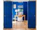 Home office features a blue accent wall at 5205 Riverview Nw Rd, Atlanta, GA 30327