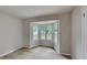 Cozy bedroom with large bay window and hardwood floors that offer beautiful natural light at 5429 Martins Crossing Rd, Stone Mountain, GA 30088