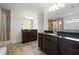 Luxury primary bathroom with granite counters, double vanity, and tile shower at 6294 Century Park Se Pl, Mableton, GA 30126