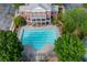 Aerial view of the pool and lounge area with mature landscaping at 6294 Century Park Se Pl, Mableton, GA 30126