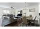 Spacious living room with hardwood floors, modern furnishings, and ample natural light at 6294 Century Park Se Pl, Mableton, GA 30126