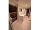 Bright bathroom features tile, a shower with curtain, and a vanity sink at 6542 Cherry Tree Ln, Atlanta, GA 30328