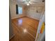 Bright bedroom with hardwood floors, ceiling fan, and painted animal designs on the wall at 6542 Cherry Tree Ln, Atlanta, GA 30328