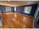 Bedroom featuring hardwood floors and window shutters at 6542 Cherry Tree Ln, Atlanta, GA 30328