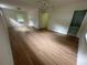 Spacious bedroom with hardwood floors, closet, and an ensuite bathroom at 6542 Cherry Tree Ln, Atlanta, GA 30328