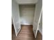 Large closet with shelving system and hardwood floors at 6542 Cherry Tree Ln, Atlanta, GA 30328