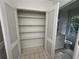 Walk-in closet with shelving and storage space, attached to a bathroom at 6542 Cherry Tree Ln, Atlanta, GA 30328