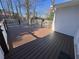 Spacious, newly constructed deck offering ample outdoor living space with sleek white railings at 6542 Cherry Tree Ln, Atlanta, GA 30328