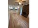 Lovely kitchen features stainless steel appliances, granite island and hardwood floors at 6542 Cherry Tree Ln, Atlanta, GA 30328