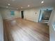 Bright living room with hardwood floors, recessed lighting, and a large window at 6542 Cherry Tree Ln, Atlanta, GA 30328