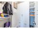 Organized walk-in closet with ample storage, shelving, and space for personal items at 2048 Rockledge Ne Rd, Atlanta, GA 30324