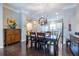 Elegant dining room with unique chandelier lighting and a clear view of the well-appointed kitchen at 2048 Rockledge Ne Rd, Atlanta, GA 30324