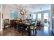 Well-lit dining room showcases an open floor plan with stylish decor, including views of the adjacent living room at 2048 Rockledge Ne Rd, Atlanta, GA 30324