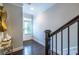 Bright foyer with hardwood floors, staircase, and access to the home's main living areas at 2048 Rockledge Ne Rd, Atlanta, GA 30324