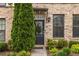 Close-up of the exterior door showing house number and meticulously maintained landscaping at 2048 Rockledge Ne Rd, Atlanta, GA 30324