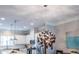 Contemporary kitchen with stainless steel appliances, a breakfast bar, and stylish pendant lighting at 2048 Rockledge Ne Rd, Atlanta, GA 30324