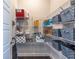Organized pantry with ample shelving and storage for dry goods and household items at 2048 Rockledge Ne Rd, Atlanta, GA 30324