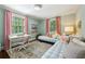 Light-filled bedroom with two twin beds, colorful rug, and pink curtains at 3086 E Pine Valley Nw Rd, Atlanta, GA 30305