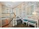 Upstairs hallway featuring a staircase and decorative mirror and console at 3086 E Pine Valley Nw Rd, Atlanta, GA 30305