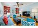 Cozy living room with built-in shelving, comfortable seating, and ample natural light at 3086 E Pine Valley Nw Rd, Atlanta, GA 30305