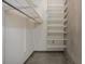 Spacious closet features customizable wire shelving, exposed concrete wall, and ample storage space at 480 John Wesley Dobbs Ne Ave # 418, Atlanta, GA 30312