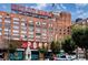 Ponce City Market exterior of the brick building and signage with an American flag on top at 480 John Wesley Dobbs Ne Ave # 418, Atlanta, GA 30312