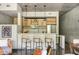 Modern kitchen featuring stainless steel appliances, light wood cabinetry, and a breakfast bar with seating at 480 John Wesley Dobbs Ne Ave # 418, Atlanta, GA 30312